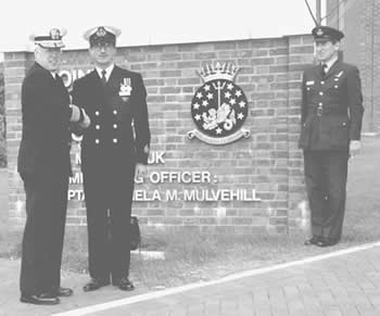 Old Al receives the Meritorious Service Medal from a passing stranger in 1997
